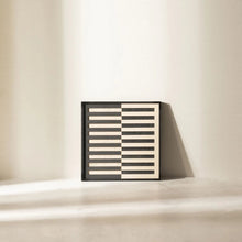 Load image into Gallery viewer, A wooden wall decor featuring horizontal stripes in black and beige colors