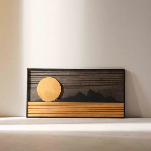 Wooden wall art with a sunset design and mountains